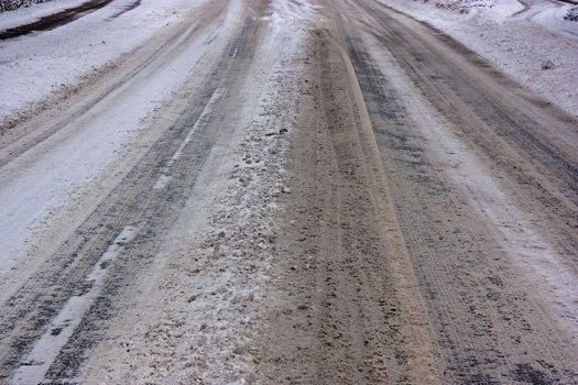 Icy gritted winter roads Icy gritted winter roads