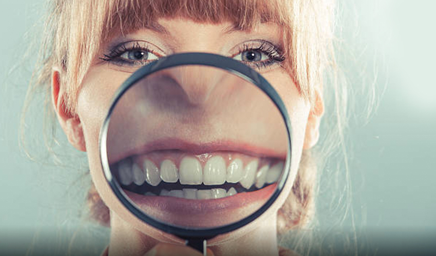 How can dentures help facial appearance