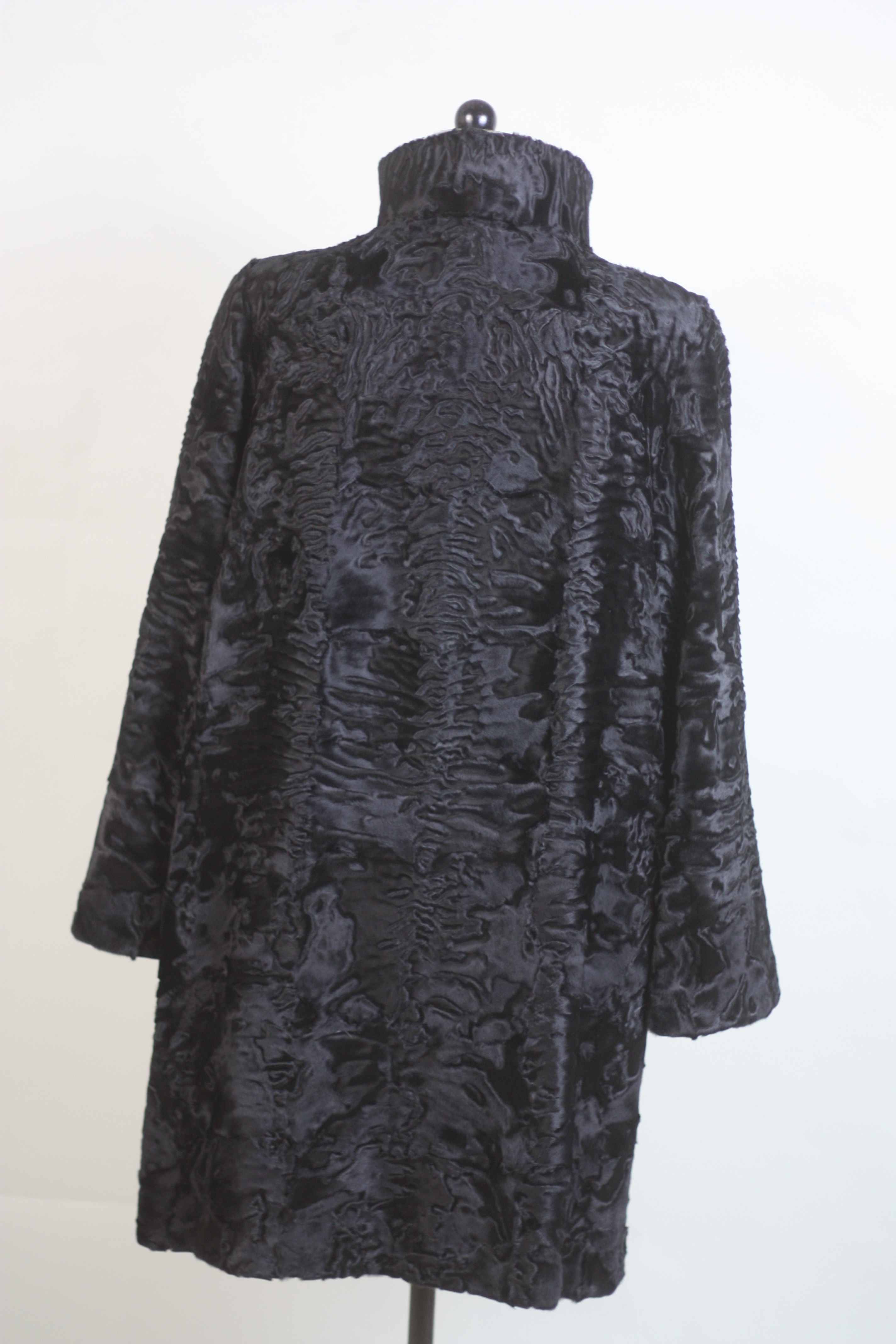 black swakara lamb fur coat rear view 3/4 length black swakara lamb fur coat rear view 3/4 length