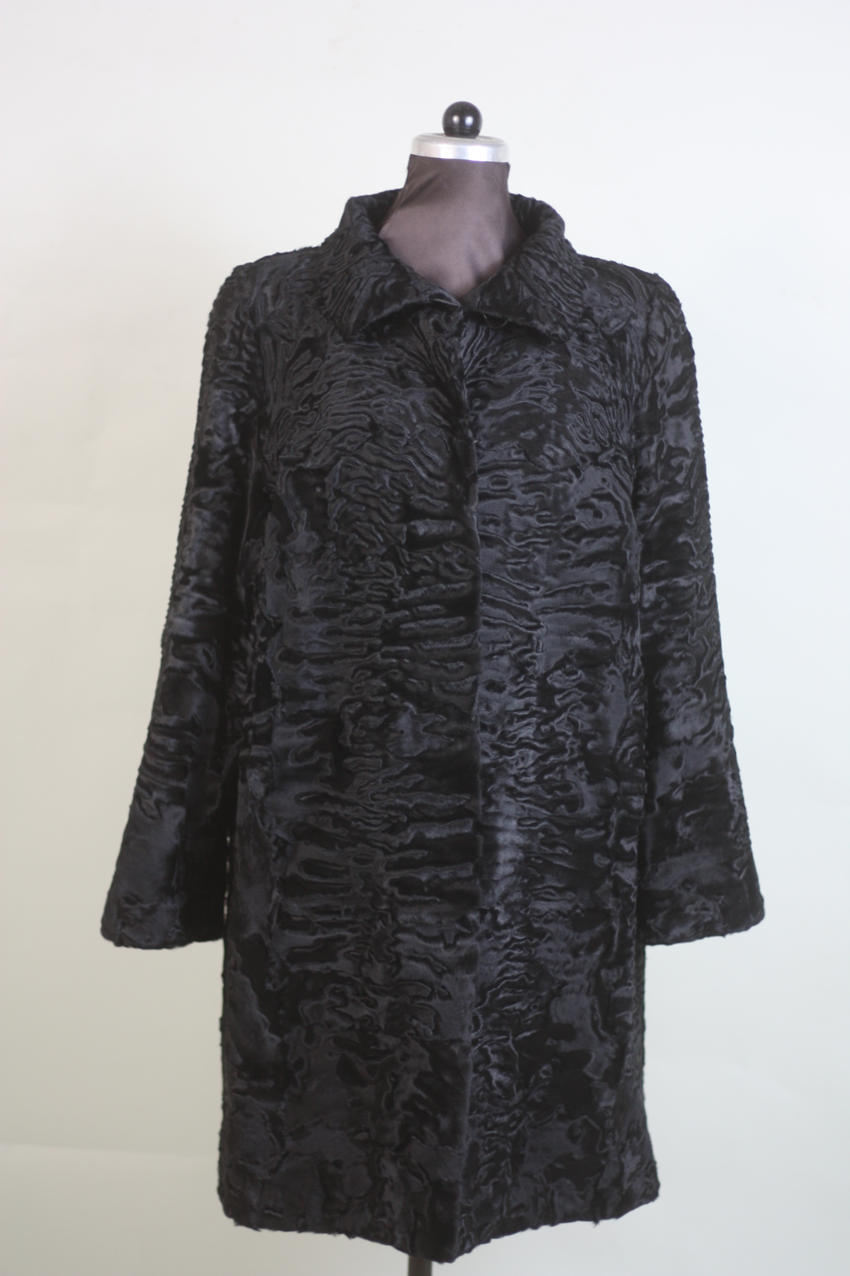 black swakara lamb fur coat front view 3/4 length black swakara lamb fur coat front view 3/4 length
