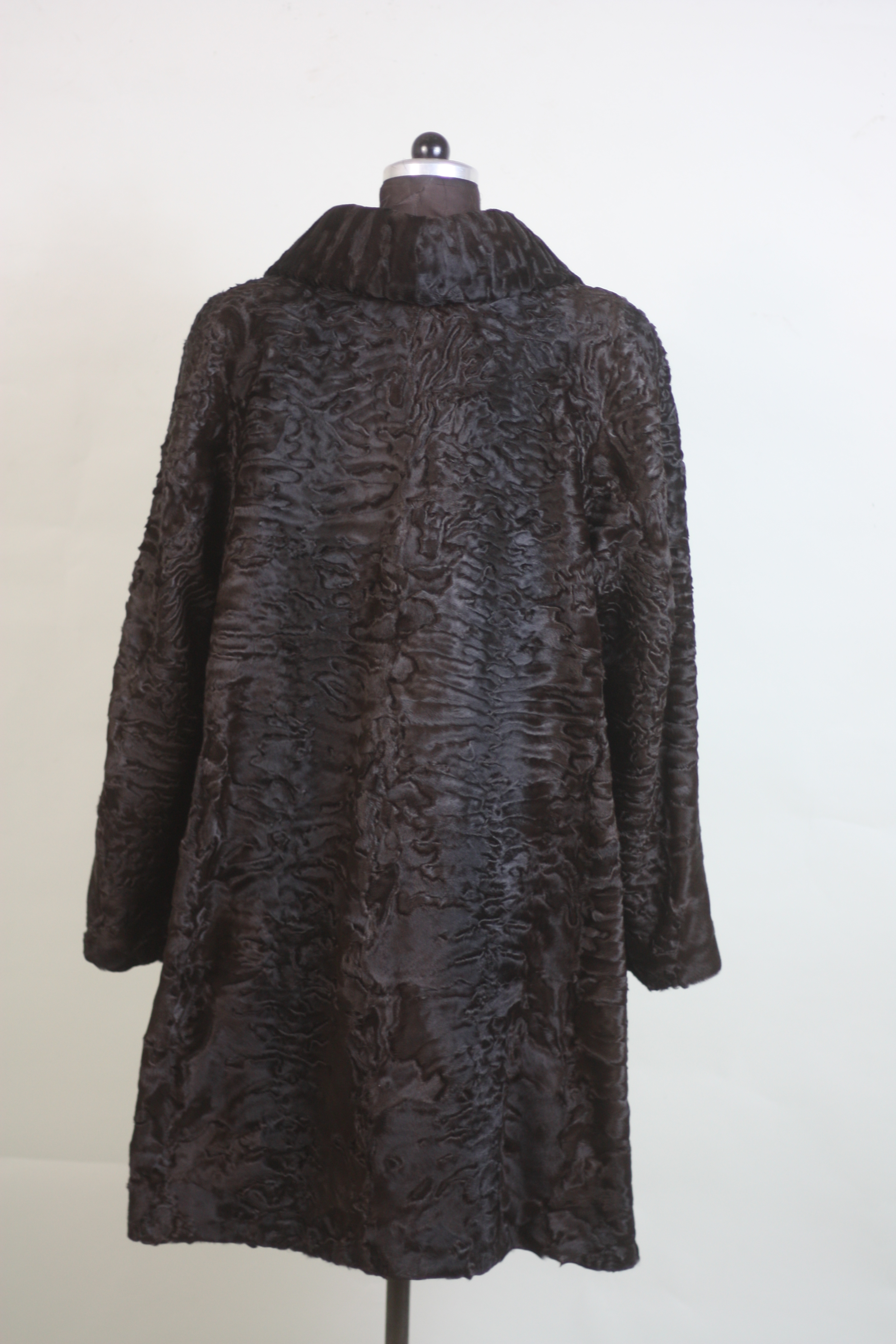 brown swakara lamb fur coat rear view 3/4 length brown swakara lamb fur coat rear view 3/4 length