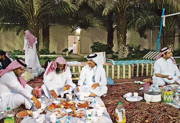 Desert Arabs enjoying a meal Desert Arabs enjoying a meal