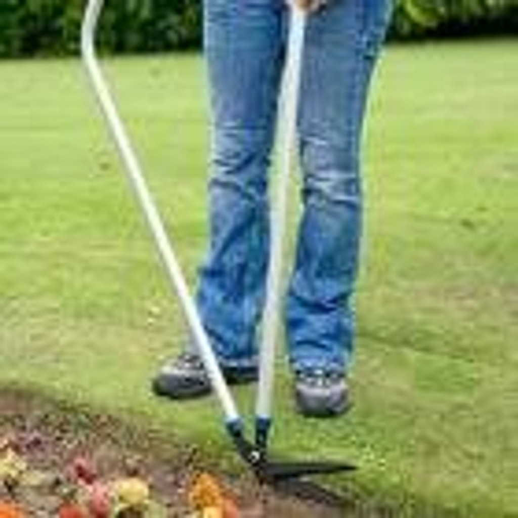 Garden shears on lawn edging