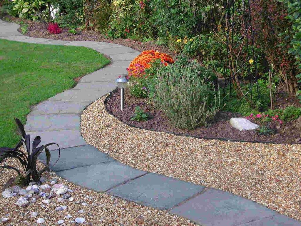 Lawn edging along gravel pathway