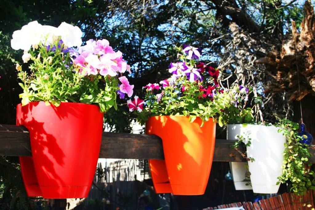 Greenbo large railing planters on wooden railing.