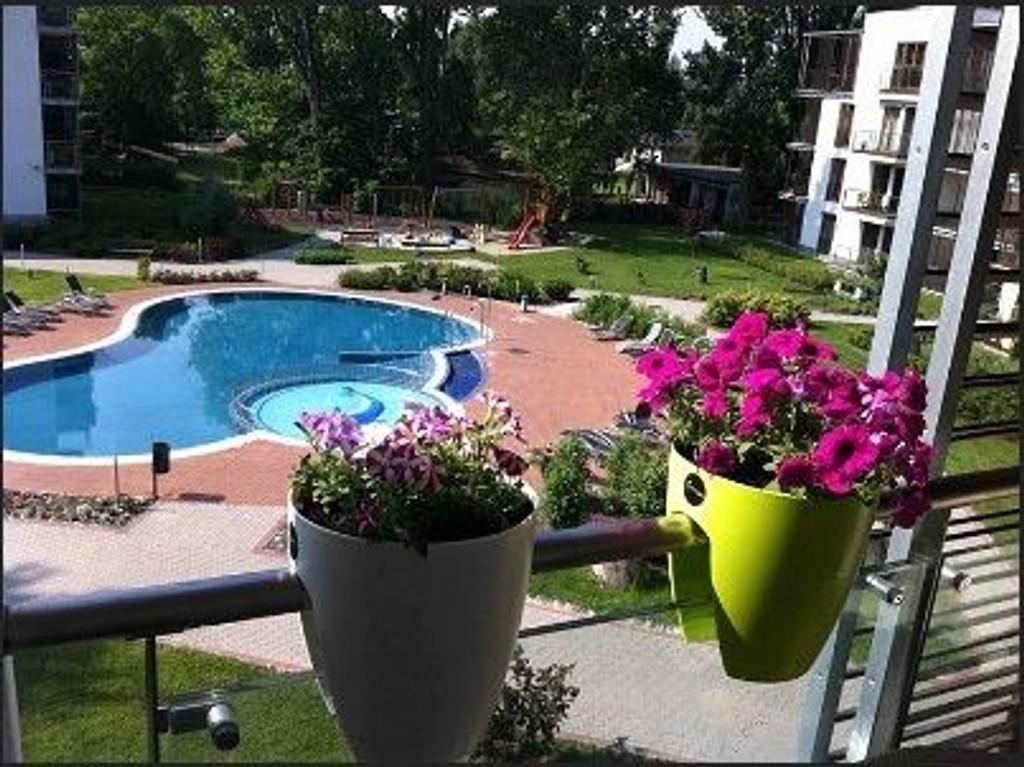Greenbo railing planters on balcony railing.