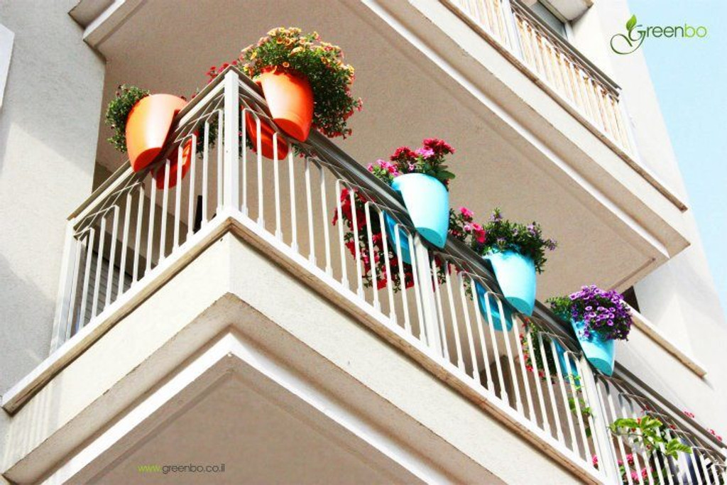 Greenbo railing planters on balcony.