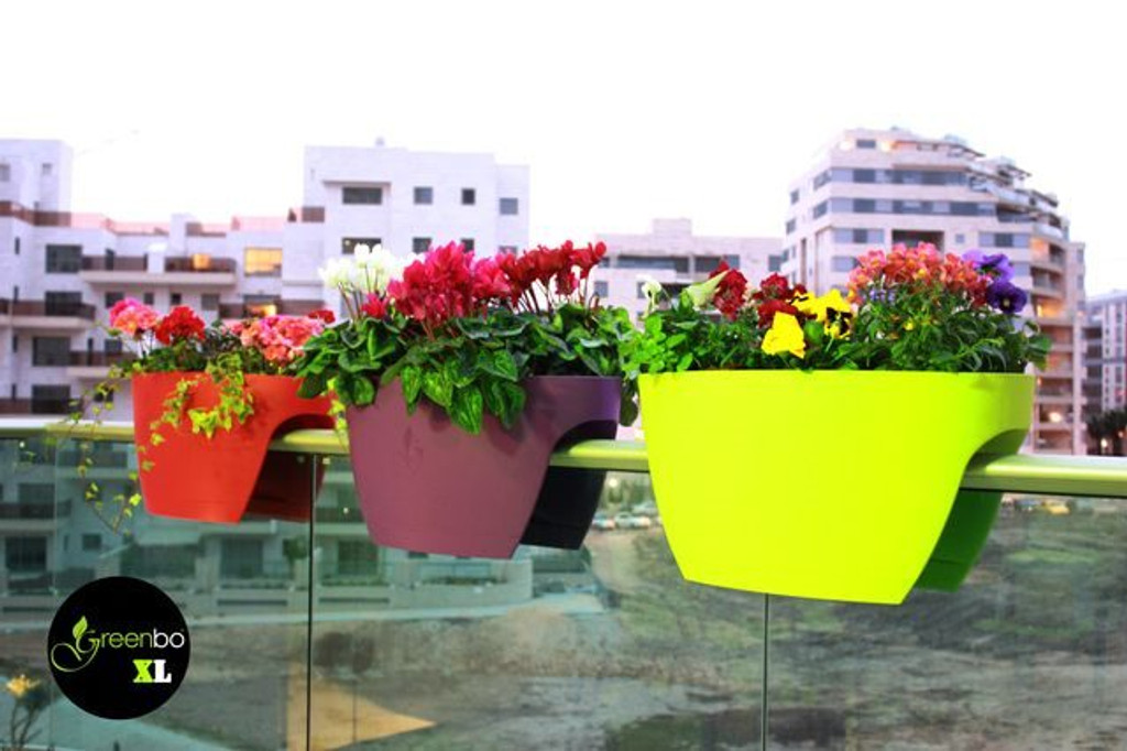 Extra large Greenbo railing planter on balcony.
