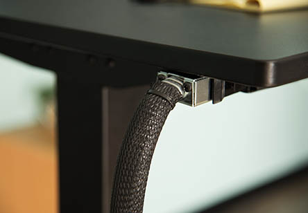 Enjoy sleek and organized power at your height adjustable desk
