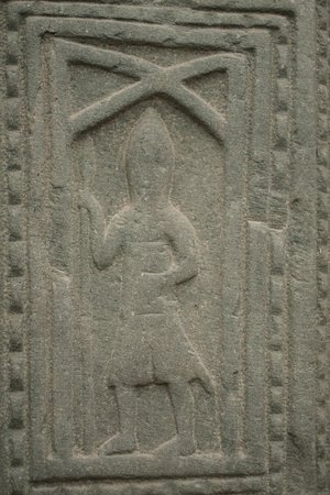 church grave slab of a kilted warrior