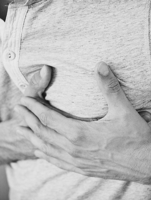 Man experiencing heart troubles from migraine