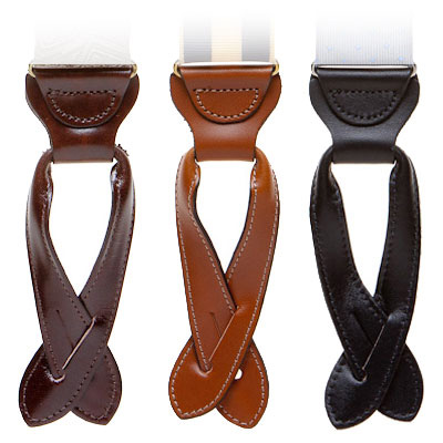 Detailed view of black and brown leather button-on suspenders
