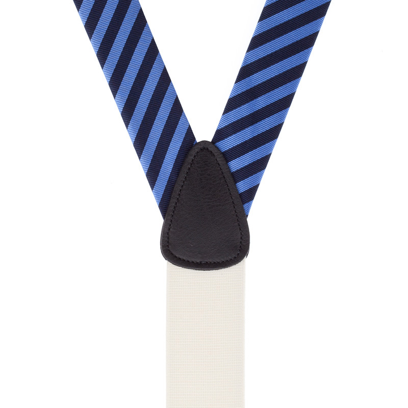 Rear view of white and navy Y-back suspenders with leather crosspatch