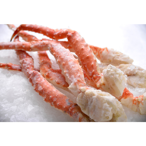 Raw King Crab legs over ice