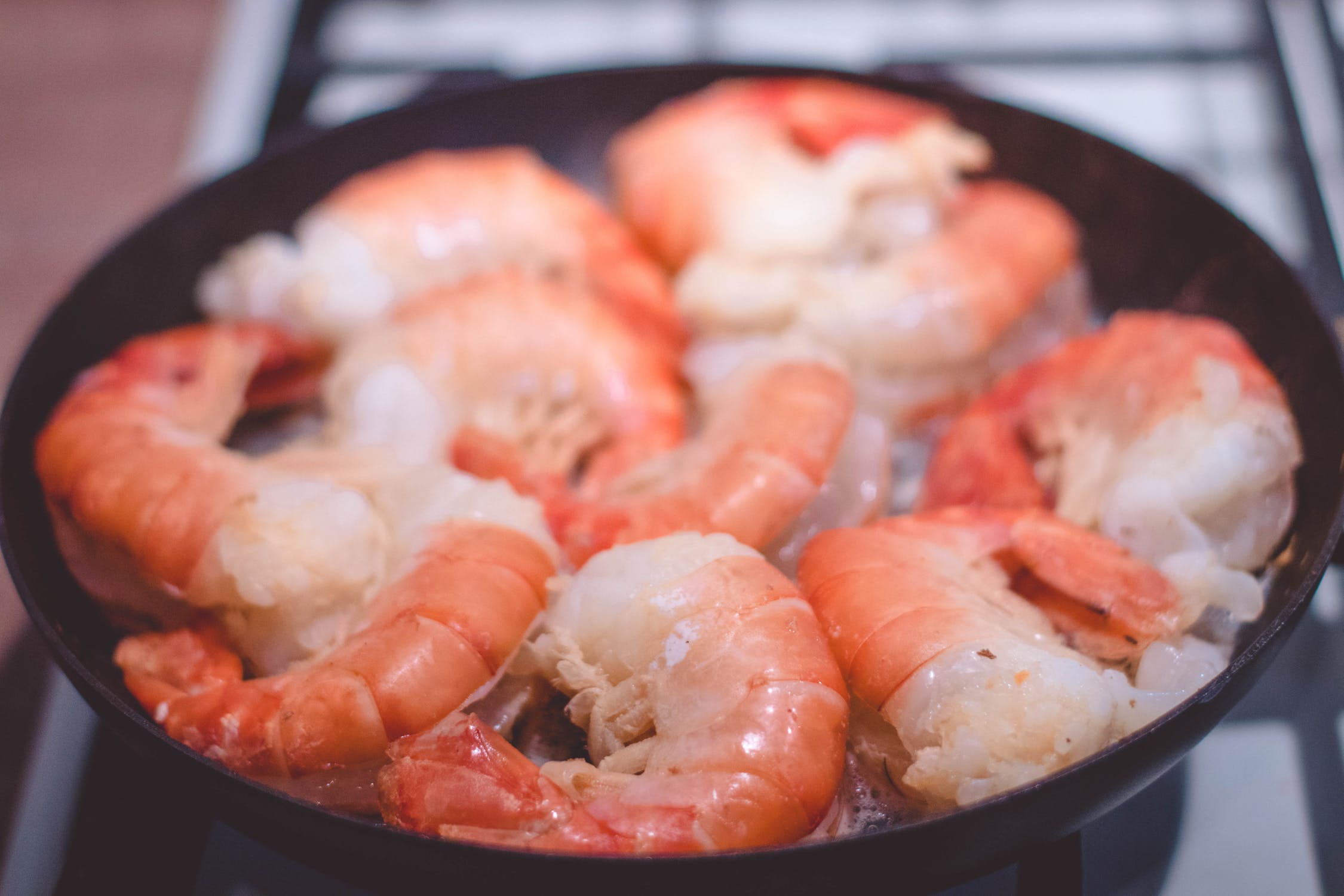 Several shrimp in a small skillet