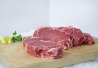 Four 12 Oz. Wholey Premium N.Y. Strip Steaks